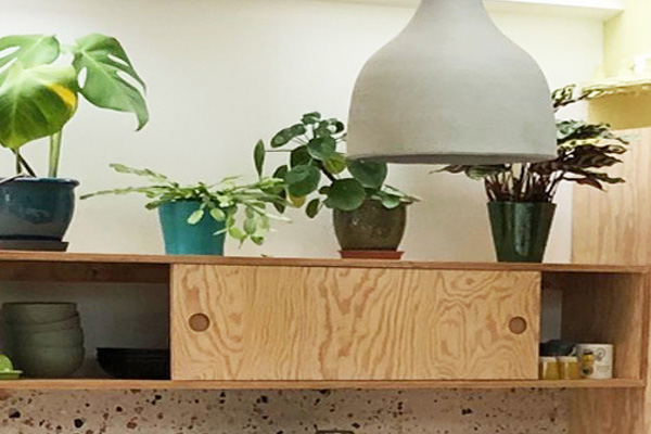 bespoke plywood sliding door overhead kitchen cabinet by The Life of Ply